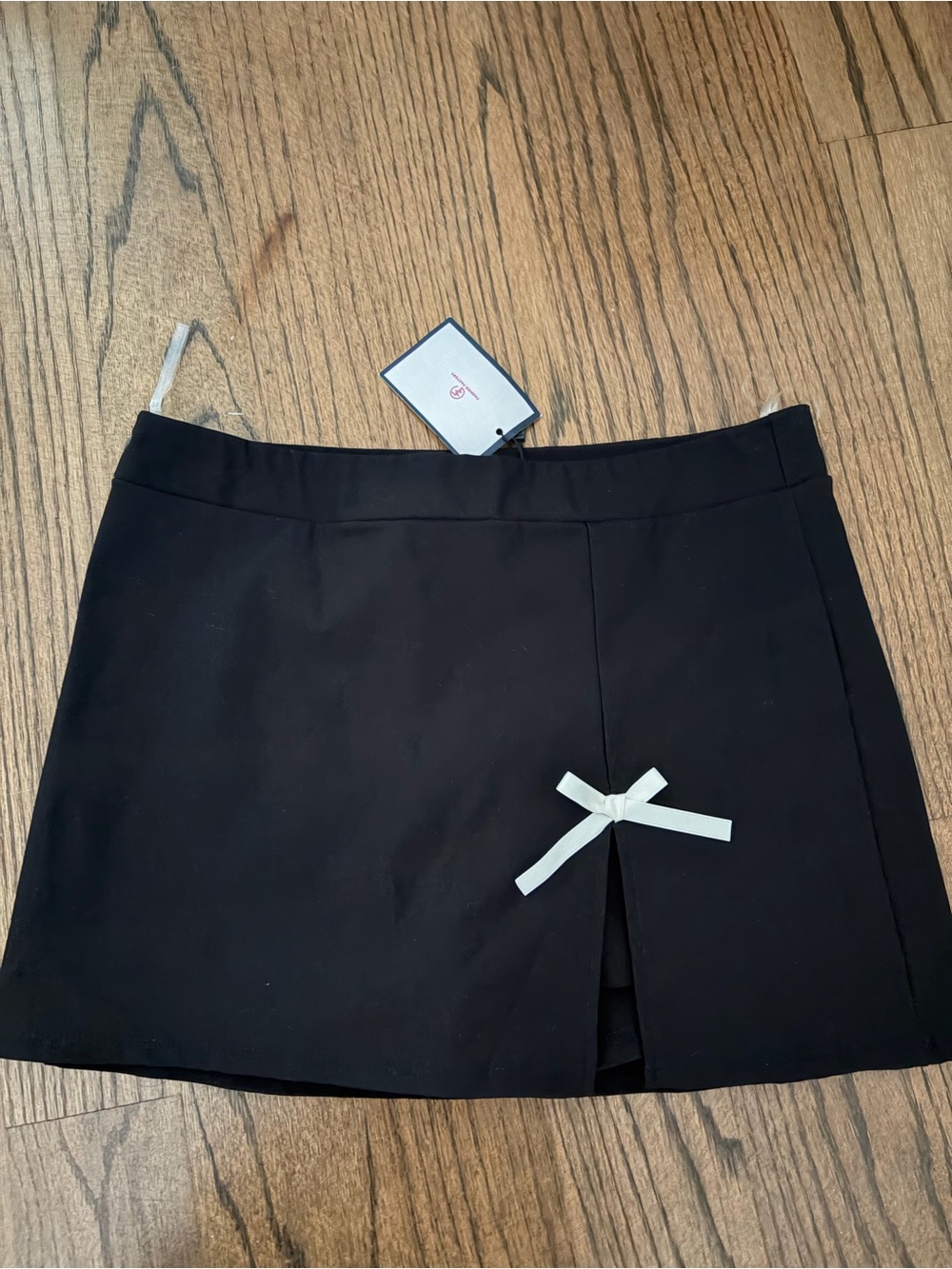 Black Mini Skort with White Bow Accent